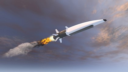white gray hypersonic missile flying in sky against gray clouds