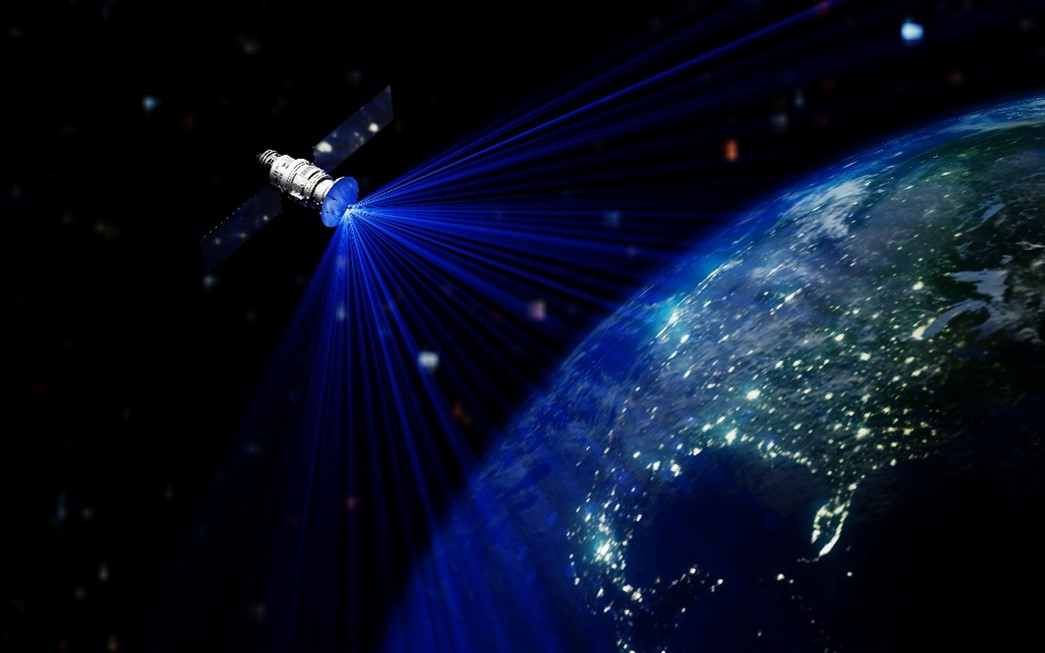 satellite beaming information over Earth with black space background