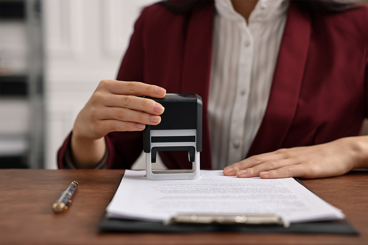 *2025 Update* Notary Essentials® Person using stamp